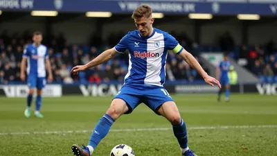 A Reuters Connect picture report from December 2025 captures a tense midfield duel between Hearts and Kilmarnock, a...
